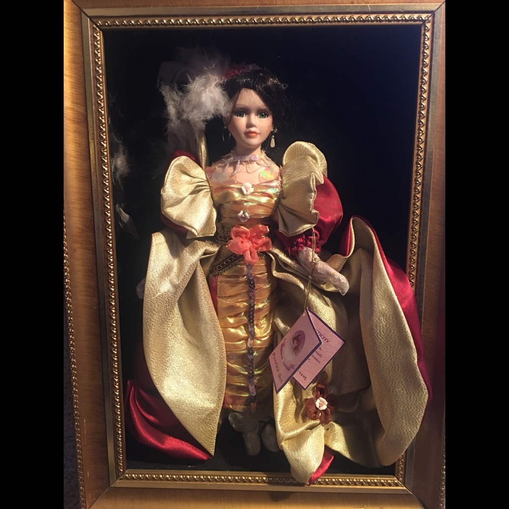 Gold-framed Goldenvale Porcelain Doll